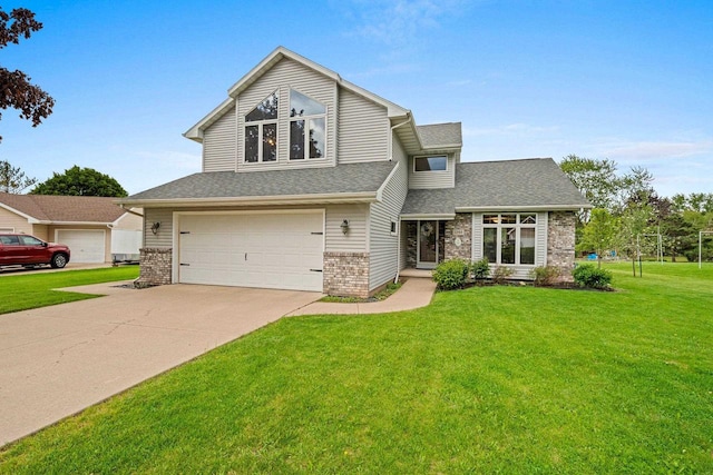 1346 Partridge Ct, Oshkosh, WI 54904 - view of front of home with an attached garage, brick siding, a front lawn, concrete driveway, and a shingled roof