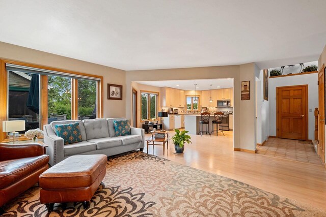 1346 Partridge Ct, Oshkosh, WI 54904 - living area featuring light wood-type flooring