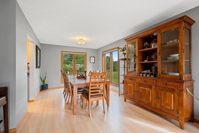 1346 Partridge Ct, Oshkosh, WI 54904 - dining room with light wood finished floors and baseboards