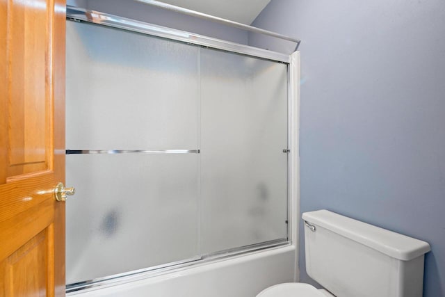 1346 Partridge Ct, Oshkosh, WI 54904 - bathroom with toilet and combined bath / shower with glass door