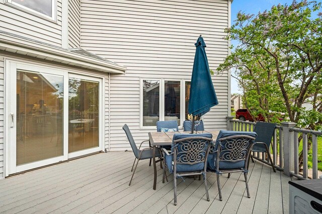 1346 Partridge Ct, Oshkosh, WI 54904 - wooden deck featuring outdoor dining area