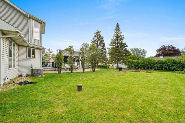 1346 Partridge Ct, Oshkosh, WI 54904 - view of green lawn featuring cooling unit