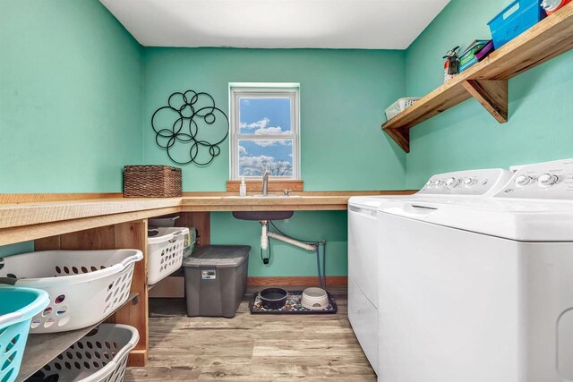 4600 Kamper Ln, Denmark, WI 54208 - washroom featuring independent washer and dryer, wood finished floors, and baseboards