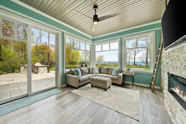 4320 High, Point Beach Lane, Port Washington, WI 53074 - sunroom featuring crown molding, wooden ceiling, baseboards, and wood finished floors