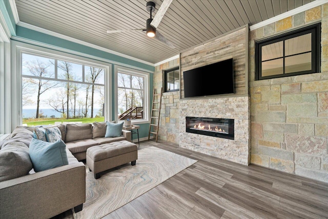 4320 High, Point Beach Lane, Port Washington, WI 53074 - living room featuring crown molding, ceiling fan, wood ceiling, a fireplace, and wood finished floors