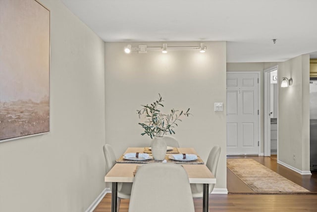 270 E Highland Ave Unit 1031, Milwaukee, WI 53202 - dining room with wood finished floors and baseboards