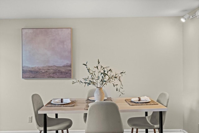 270 E Highland Ave Unit 1031, Milwaukee, WI 53202 - dining area featuring baseboards