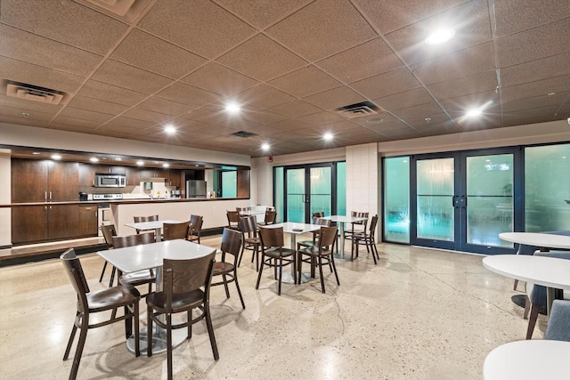 270 E Highland Ave Unit 1031, Milwaukee, WI 53202 - dining area featuring french doors and a drop ceiling