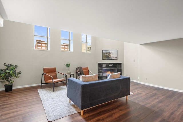 270 E Highland Ave Unit 1031, Milwaukee, WI 53202 - living area with dark wood-style flooring, baseboards, and a fireplace