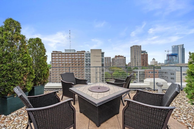 270 E Highland Ave Unit 1031, Milwaukee, WI 53202 - view of patio / terrace with a view of city and outdoor dining area