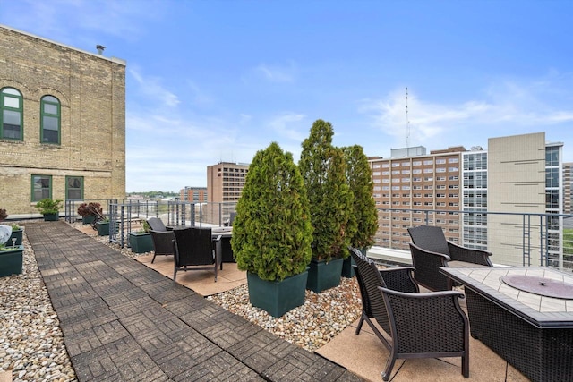 270 E Highland Ave Unit 1031, Milwaukee, WI 53202 - view of patio featuring outdoor dining area