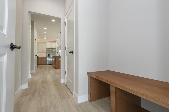 20840 Gray St, Lannon, WI 53046 - mudroom featuring recessed lighting, light wood finished floors, and baseboards