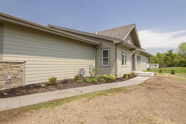 20840 Gray St, Lannon, WI 53046 - view of side of property featuring a shingled roof