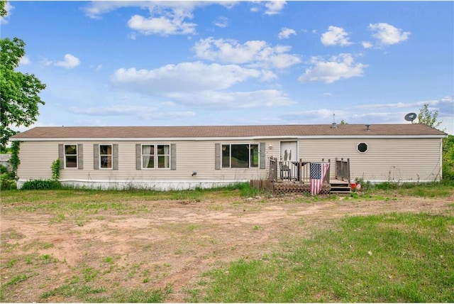 2077A 250th Ave Unit N, Luck, WI 54853 - back of house with a deck