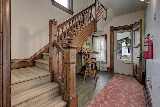535 Jackson St, Oshkosh, WI 54901 - foyer with stairs, wood finished floors, and lofted ceiling