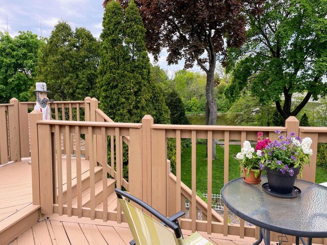 620 W Rock Pl, Glendale, WI 53209 - wooden deck featuring view of scattered trees