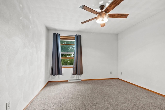 1330 Pinehurst Ln, Neenah, WI 54956 - spare room featuring ceiling fan, carpet flooring, and baseboards