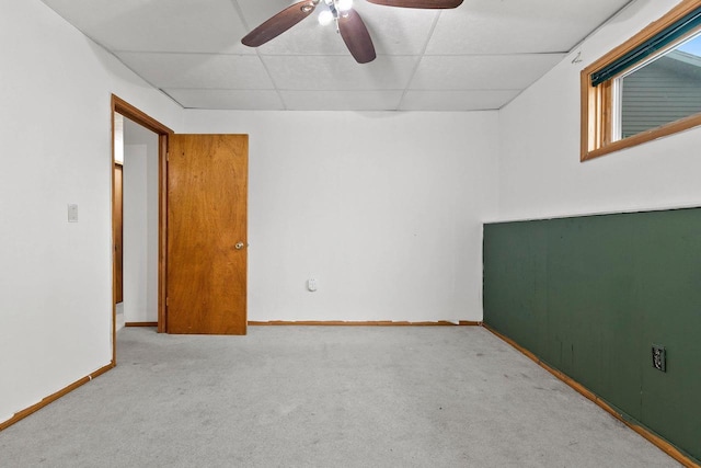1330 Pinehurst Ln, Neenah, WI 54956 - carpeted spare room with a drop ceiling, a ceiling fan, and baseboards