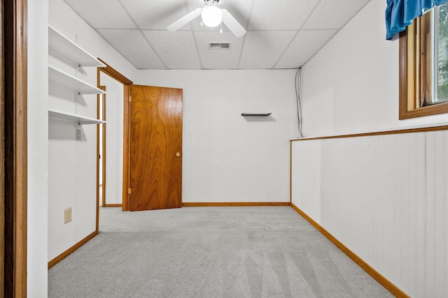 1330 Pinehurst Ln, Neenah, WI 54956 - unfurnished bedroom with a paneled ceiling, carpet flooring, baseboards, and ceiling fan