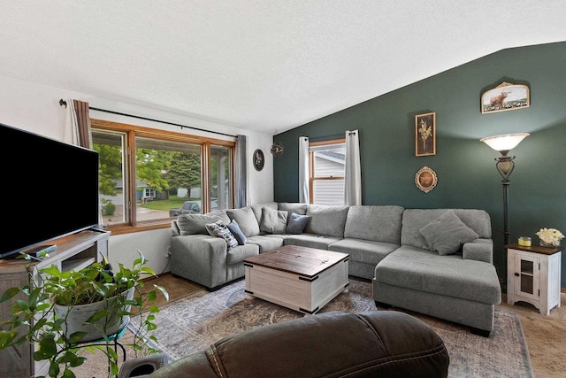 1330 Pinehurst Ln, Neenah, WI 54956 - carpeted living room with lofted ceiling and a textured ceiling