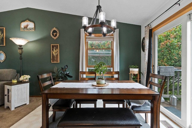 1330 Pinehurst Ln, Neenah, WI 54956 - dining area with vaulted ceiling, a chandelier, carpet flooring, and baseboards
