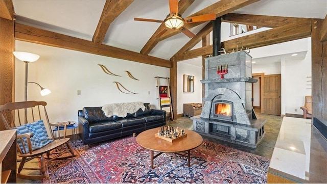 N30732 Square Bluff Rd, Blair, WI 54616 - living room featuring high vaulted ceiling, beam ceiling, ceiling fan, baseboards, and a wood stove