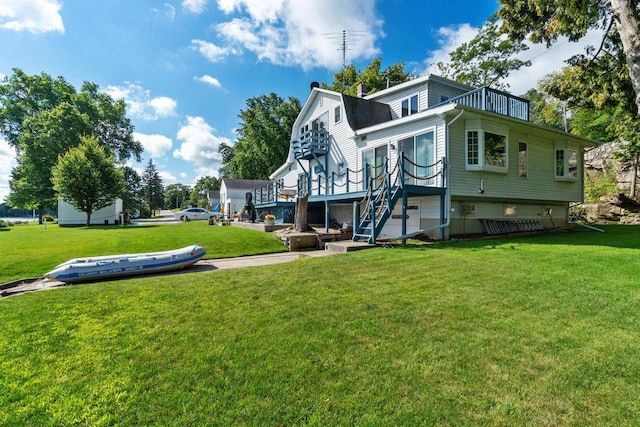 440 N Hudson Ave, Sturgeon Bay, WI 54235 - back of property with a lawn and stairs