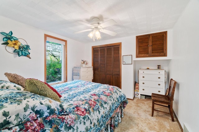 440 N Hudson Ave, Sturgeon Bay, WI 54235 - bedroom with a closet, light colored carpet, ceiling fan, and baseboards