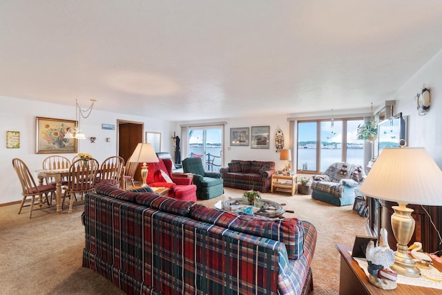 440 N Hudson Ave, Sturgeon Bay, WI 54235 - living room with carpet flooring, healthy amount of natural light, and a water view