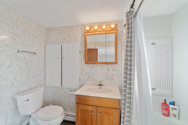 440 N Hudson Ave, Sturgeon Bay, WI 54235 - bathroom with baseboard heating, vanity, toilet, and shower / bath combo
