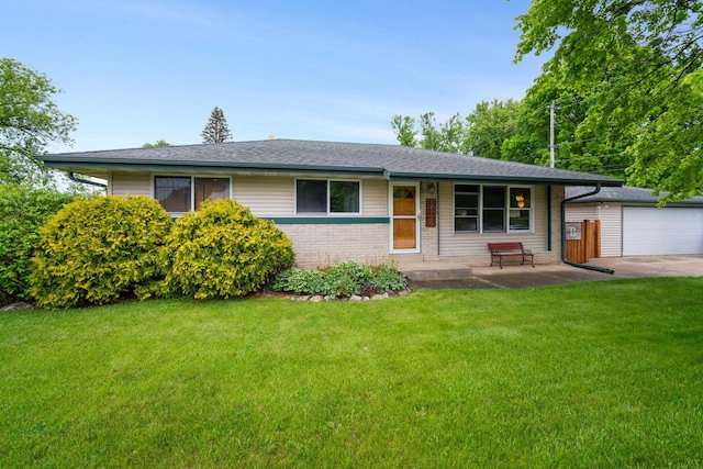 17120 W Fullerton Ave, New Berlin, WI 53151 - view of front of home featuring a front yard, brick siding, a garage, and covered porch