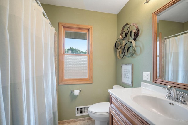 17120 W Fullerton Ave, New Berlin, WI 53151 - bathroom with toilet, vanity, and tile patterned flooring
