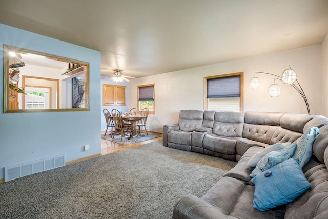 17120 W Fullerton Ave, New Berlin, WI 53151 - carpeted living room with a ceiling fan and baseboards
