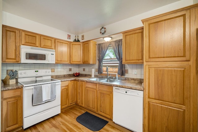 17120 W Fullerton Ave, New Berlin, WI 53151 - kitchen with white appliances, a sink, tasteful backsplash, and light wood-style floors
