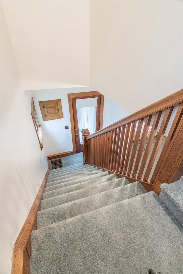 305 N 1st St, Colby, WI 54421 - stairs featuring carpet floors