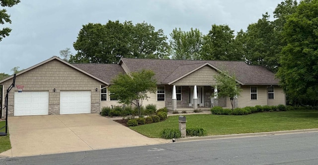 121 Doc Mac Dr, Boscobel, WI 53805 - craftsman house featuring a garage, driveway, a front yard, covered porch, and brick siding