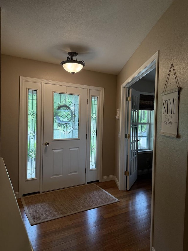 121 Doc Mac Dr, Boscobel, WI 53805 - entrance foyer featuring wood finished floors and baseboards