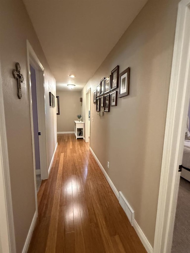 121 Doc Mac Dr, Boscobel, WI 53805 - hallway featuring hardwood / wood-style flooring and baseboards