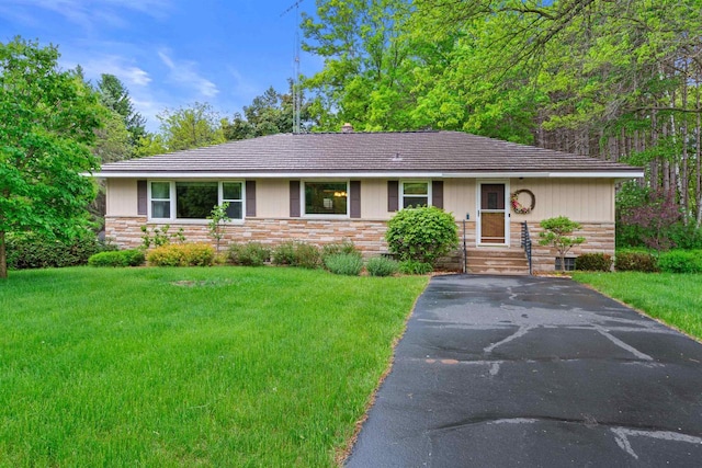 3594 Sunset Dr N, Stevens Point, WI 54482 - ranch-style home featuring a front lawn and stone siding