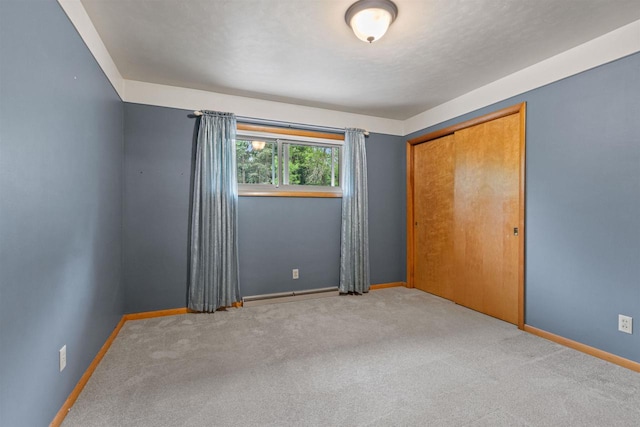 3594 Sunset Dr N, Stevens Point, WI 54482 - unfurnished bedroom with carpet flooring and baseboards