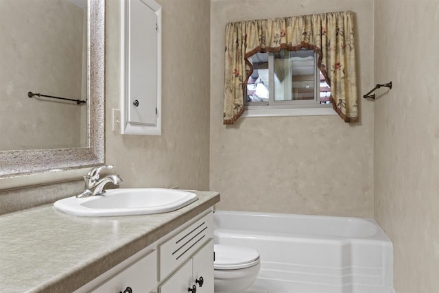 3594 Sunset Dr N, Stevens Point, WI 54482 - bathroom featuring toilet, vanity, and a bath