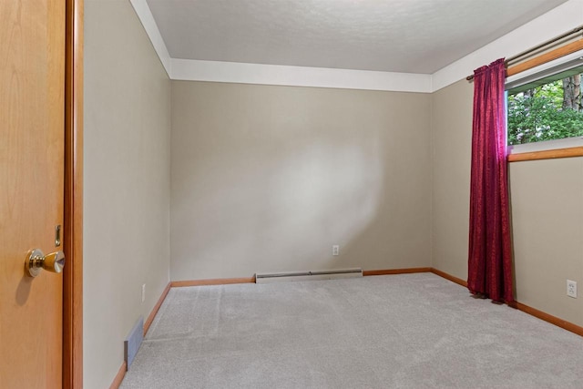 3594 Sunset Dr N, Stevens Point, WI 54482 - unfurnished room with a baseboard radiator, carpet floors, and baseboards