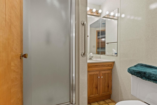 3594 Sunset Dr N, Stevens Point, WI 54482 - full bathroom with a stall shower, vanity, and toilet