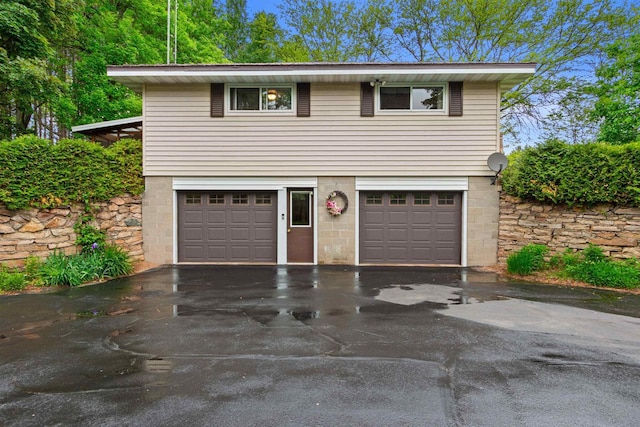 3594 Sunset Dr N, Stevens Point, WI 54482 - view of front facade featuring a garage and driveway