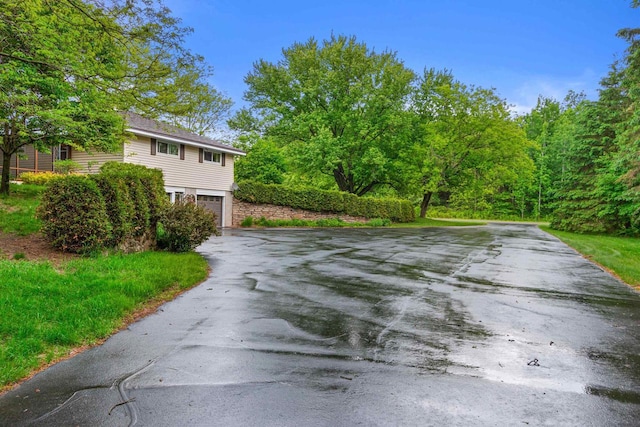 3594 Sunset Dr N, Stevens Point, WI 54482 - view of asphalt driveway