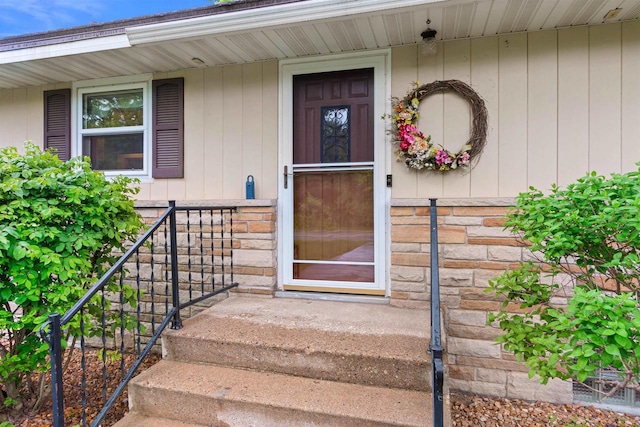 3594 Sunset Dr N, Stevens Point, WI 54482 - property entrance featuring stone siding and covered porch