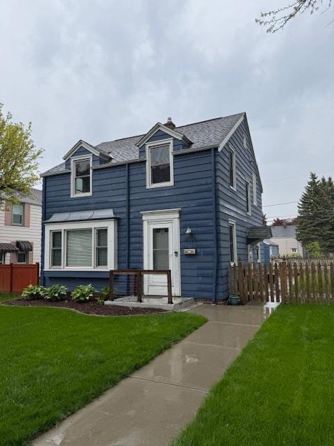 3552 S Pine Ave, Milwaukee, WI 53207 - view of front of home featuring a shingled roof and a chimney