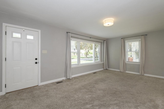 3552 S Pine Ave, Milwaukee, WI 53207 - foyer with baseboards and carpet