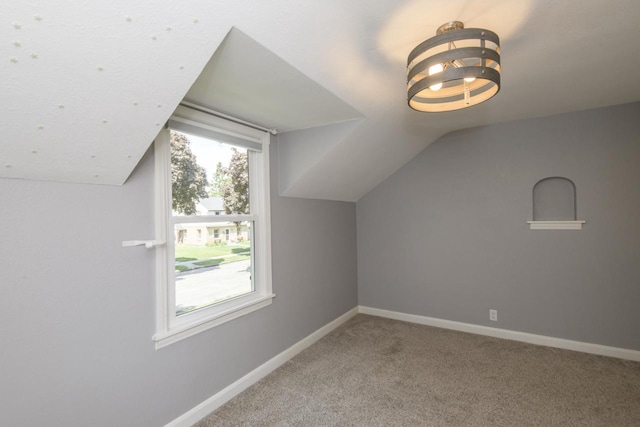 3552 S Pine Ave, Milwaukee, WI 53207 - additional living space featuring vaulted ceiling, baseboards, and carpet floors