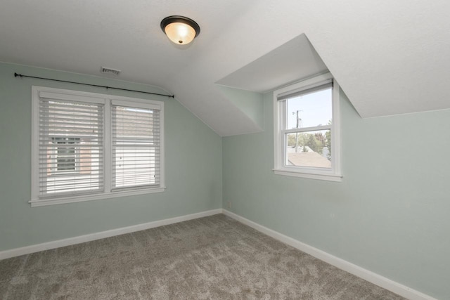 3552 S Pine Ave, Milwaukee, WI 53207 - bonus room with lofted ceiling, baseboards, carpet, and plenty of natural light